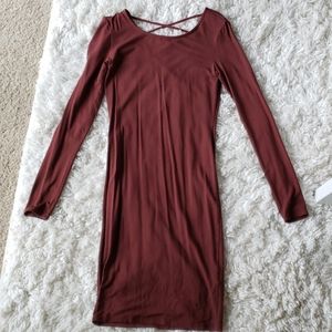 Long sleeved cross back dress